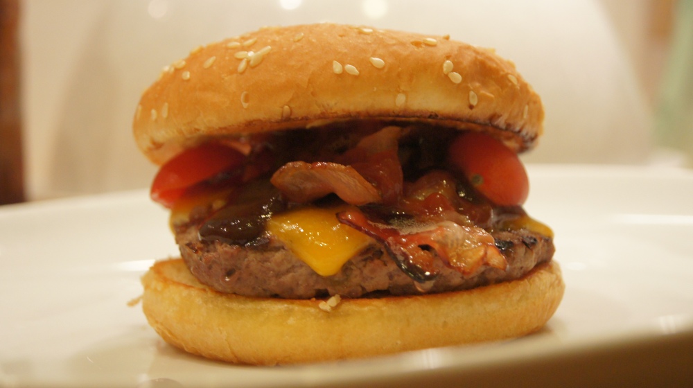 Finished bacon cheeseburger